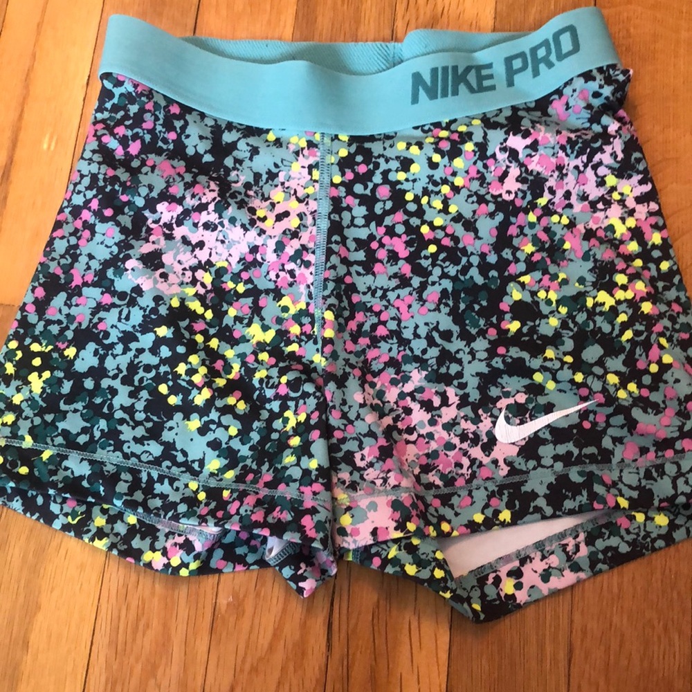 multicolor NIKE Pro shorts